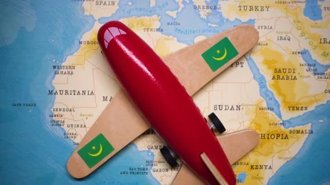 A plane with a flag of Mauritania crossing the map. Stock Footage 143982174