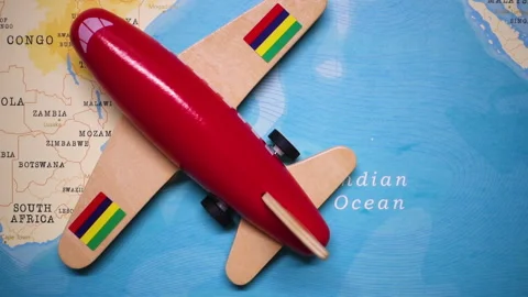 A plane with a flag of Mauritius crossing the map. Stock Footage 143982235