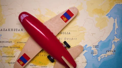 A plane with a flag of Mongolia crossing the map. Stock Footage 143982280