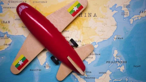A plane with a flag of Myanmar crossing the map. Stock Footage 143982291