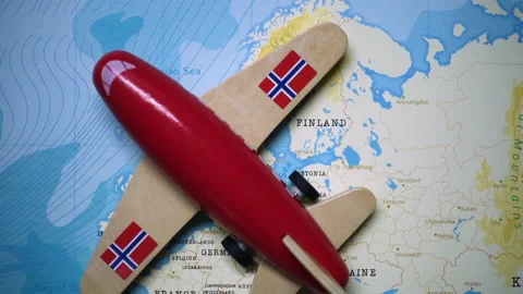 A plane with a flag of Norway crossing the map. Stock Footage 143983625