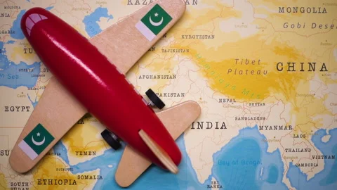 A plane with a flag of Pakistan crossing the map. Stock Footage 143982478