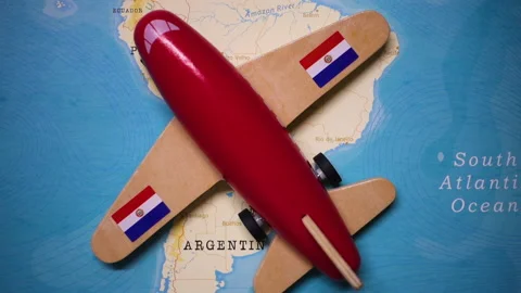 A plane with a flag of Paraguay crossing the map. Stock Footage 143982502
