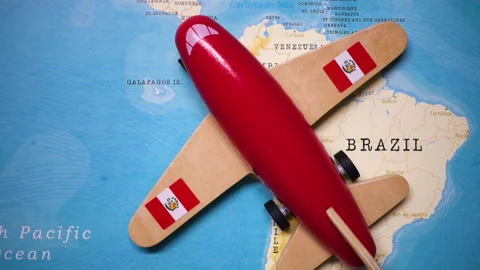 A plane with a flag of Peru crossing the map. Stock Footage 143982517