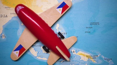 A plane with a flag of Philippines crossing the map. Stock Footage 143982627