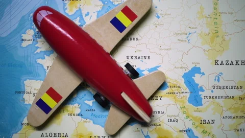 A plane with a flag of Romania crossing the map. Stock Footage 143983770