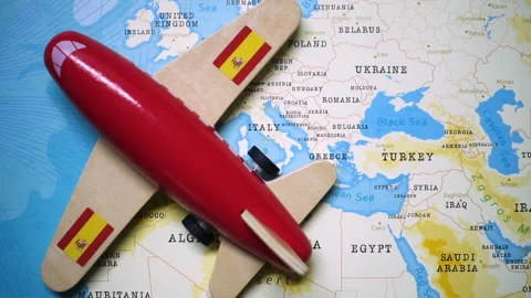 A plane with a flag of Spain crossing the map. Stock Footage 143983931