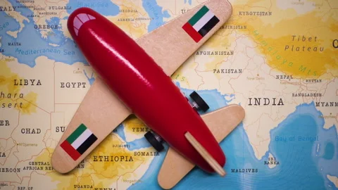 A plane with a flag of UAE crossing the map. Stock Footage 143983159