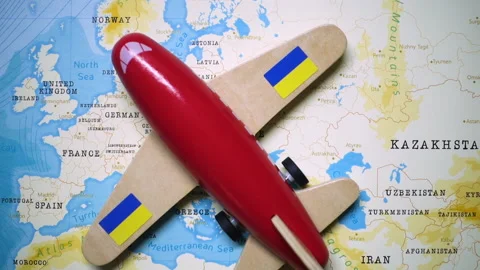 A plane with a flag of Ukraine crossing the map. Stock Footage 143984002