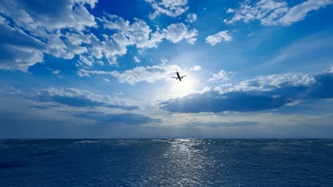 The plane flew over the sea Видео 169833609