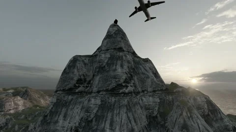 The plane flew over the top of the mountain Stock Footage 172136497