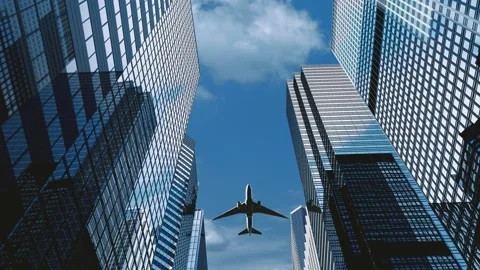 The plane flew over the top of the tall building Stock Footage 177212156