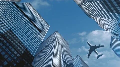 The plane flew over the top of the tall building Stock Footage 179308169