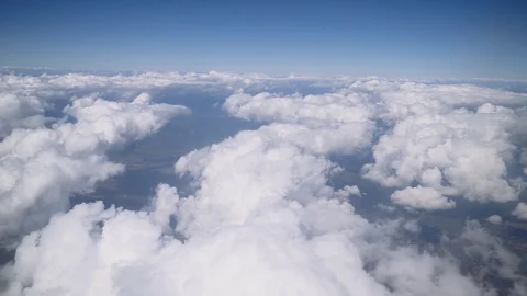 The plane flies above the clouds, the view from the window. Stock Footage 97181119