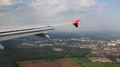 Plane flies up to the airport Stock Footage 165560071