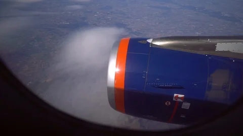 The plane flies beautifully over the clouds. Stock Footage 91985968