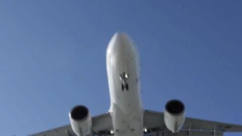 Plane flies close-up bottom view,air tickets,travel and tourism, air transp.. Stock Footage 237701502