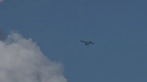 Plane flies into huge cloud Stock Footage 1183061