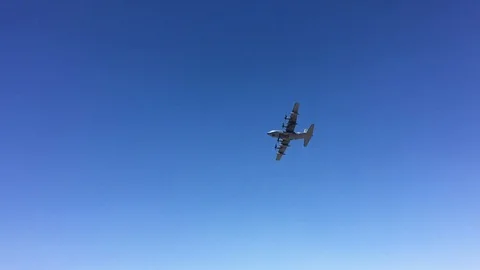The plane flies in the mountains over the desert. California Stock Footage 95693083