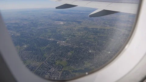 Plane Flies Over City Stock Footage 123624585