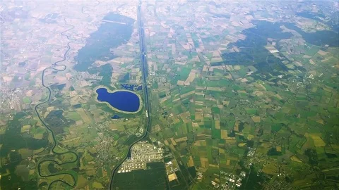 The plane flies over Germany on approaching the Lingen Ems . Stock Footage 74476897