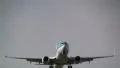 plane flies over lamp post HD Footage