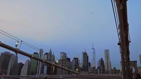 Plane flies over Manhattan Stock Footage 129167131
