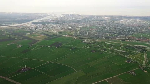 The plane flies over Netherlands on approaching the Amsterdam 스톡 동영상 74478776