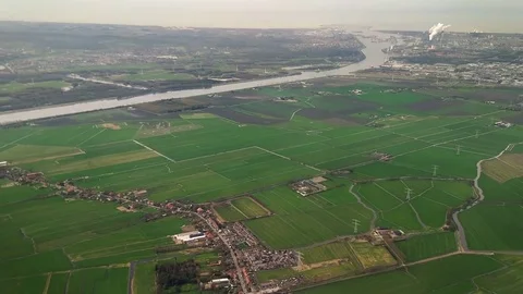 The plane flies over Netherlands on approaching the Amsterdam 動画素材 74478919