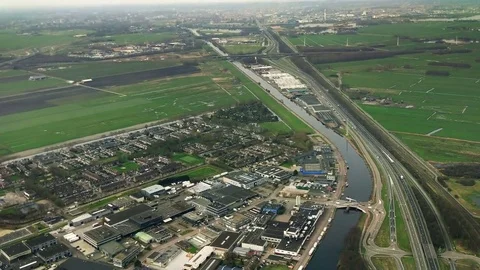 The plane flies over Netherlands on approaching the Amsterdam Vídeo Stock 74479124
