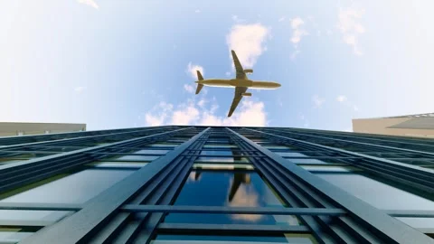 Plane flies over the office roofs of high-end business buildings Stock Footage 288181111