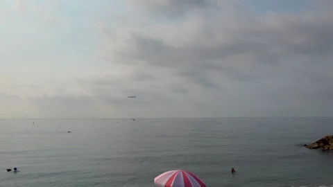 The plane flies over the sea Stock Footage 342036321