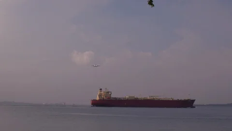 The plane flies over ship 스톡 동영상 104111361