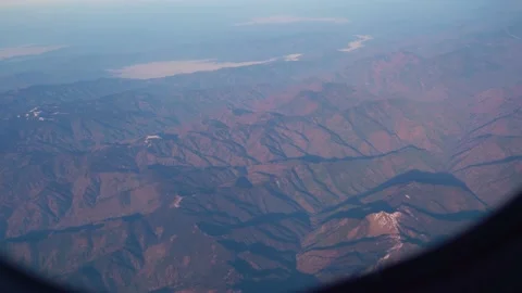 The plane flies over the snowy mountain peaks of the Alps, Leh, India. Stock Footage 145963528