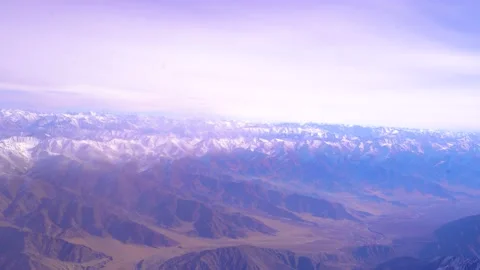 The plane flies over the snowy mountain peaks of the Alps, Leh, India. Vídeos de archivo 145964705
