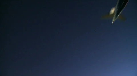 Plane flies overhead at night (3 of 3) Stock Footage