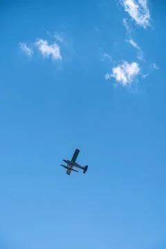 Plane Flies Overhead Stock Photos