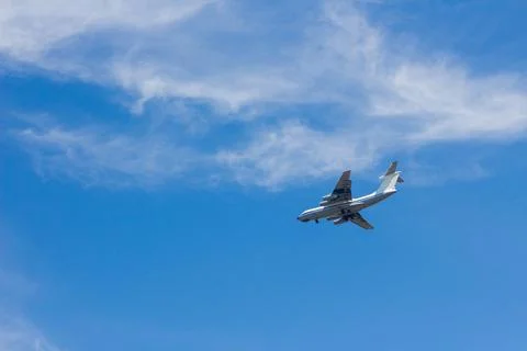 The plane flies in the sky Stock Photos