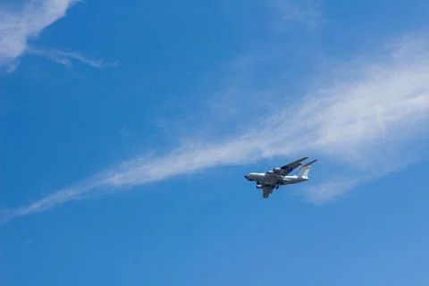 The plane flies in the sky Stock Photos