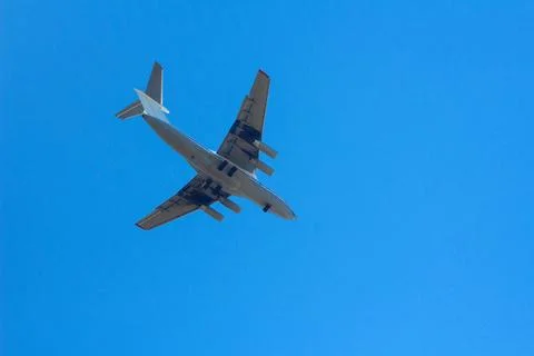 The plane flies in the sky Stock Photos