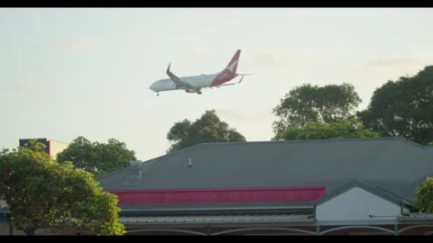 A plane flies into Sydney Stock Footage 289809572