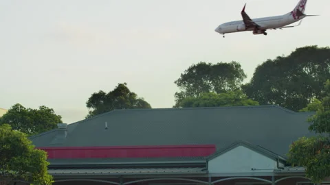 A plane flies into Sydney Stock Footage 289809617
