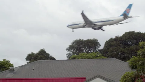 A plane flies into Sydney Stock Footage 290286744
