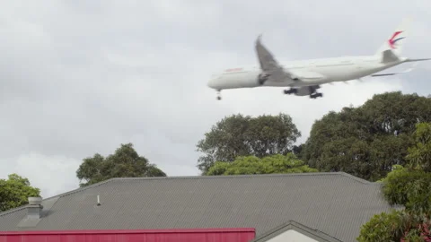 A plane flies into Sydney Stock Footage 290288416