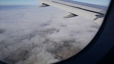 Plane Flies Through Clouds Stock Footage 123624652