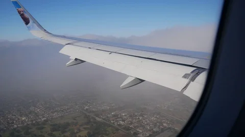 Plane Flies Through Clouds Stock Footage 123624700