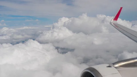 The plane flies through the clouds Stock Footage 304140514