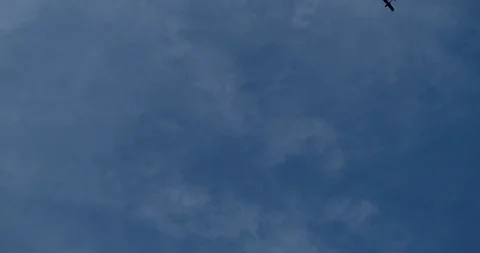 Plane flies through the clouds. A small plane flies in the sky. Air and big Stock Footage 112255842