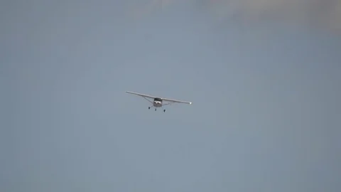 Plane flies toward camera Stock Footage 79464368