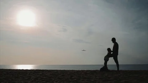 Plane flies very low over the beach. Stock Footage 71136325